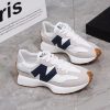 New Balance 327 Preto com Branco New Balance 327 Preto com Branco